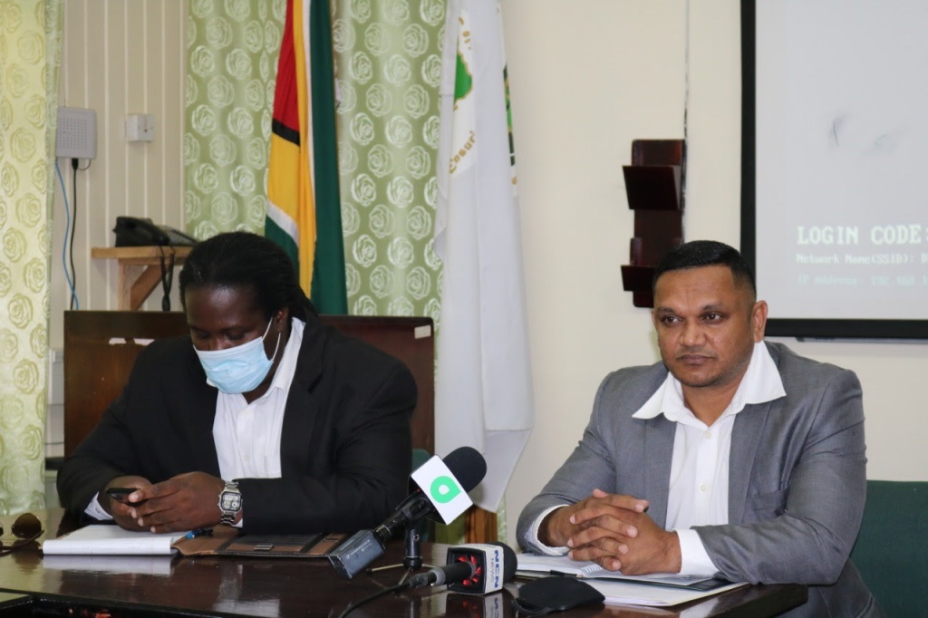 Permanent Secretary of the Ministry of Natural Resources, Mr. Joslyn McKenzie, along with Minister of Natural Resources, Hon. Vickram Bharrat, at the GFC meeting
